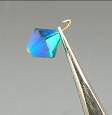 Tweezers holding a bead on wire